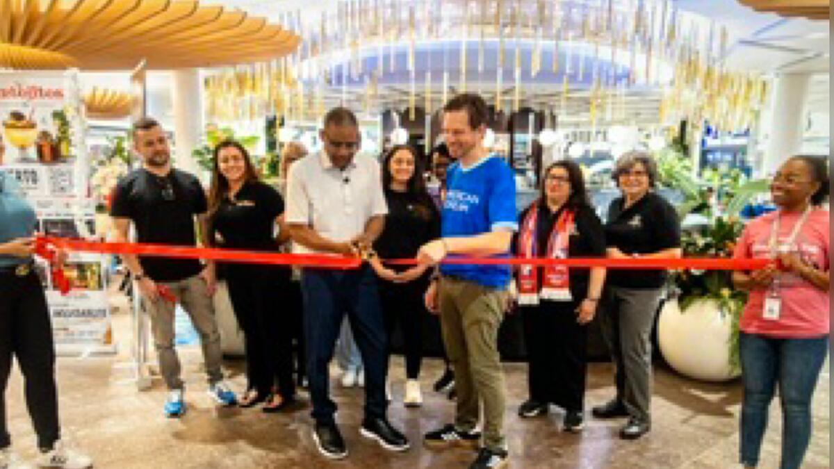 Ribbon-cutting photograph accompanying the World Cup business coverage
